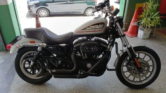 Moto Harley-Davidson Sportster XL 883 2013 Roadster