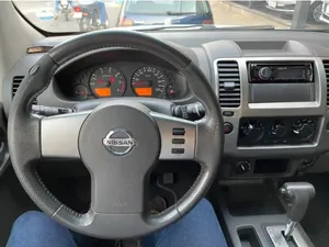 Nissan Frontier 2012 LE 4x4 2.5 16V (cab. dupla) (aut)